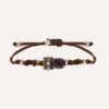 Pulsera SUNFIELD PU065550/26 tiene  un motivo central de plata de ley 925 con circonitas de color, acompañado de una amatista, citrino y cuarzo rosa.