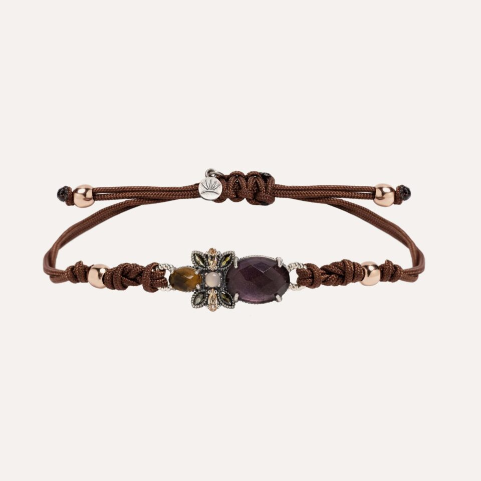 Pulsera SUNFIELD PU065550/26 tiene  un motivo central de plata de ley 925 con circonitas de color, acompañado de una amatista, citrino y cuarzo rosa.