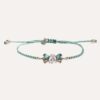 Pulsera SUNFIELD PU067494 tiene  un motivo central de plata de ley 925 con circonitas de color, todo engastado a mano. cierre de macrame
