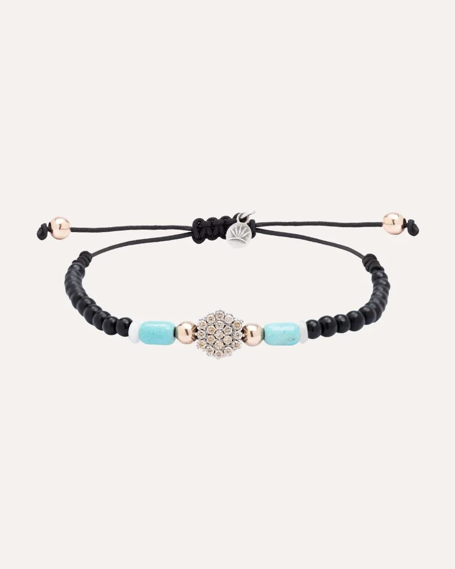 Pulsera SUNFIELD PU068482 tiene  un motivo con circonitas de. unas cuentas de cristal de 3mm. con algún detalle de plata chapada en oro rosa 18k.